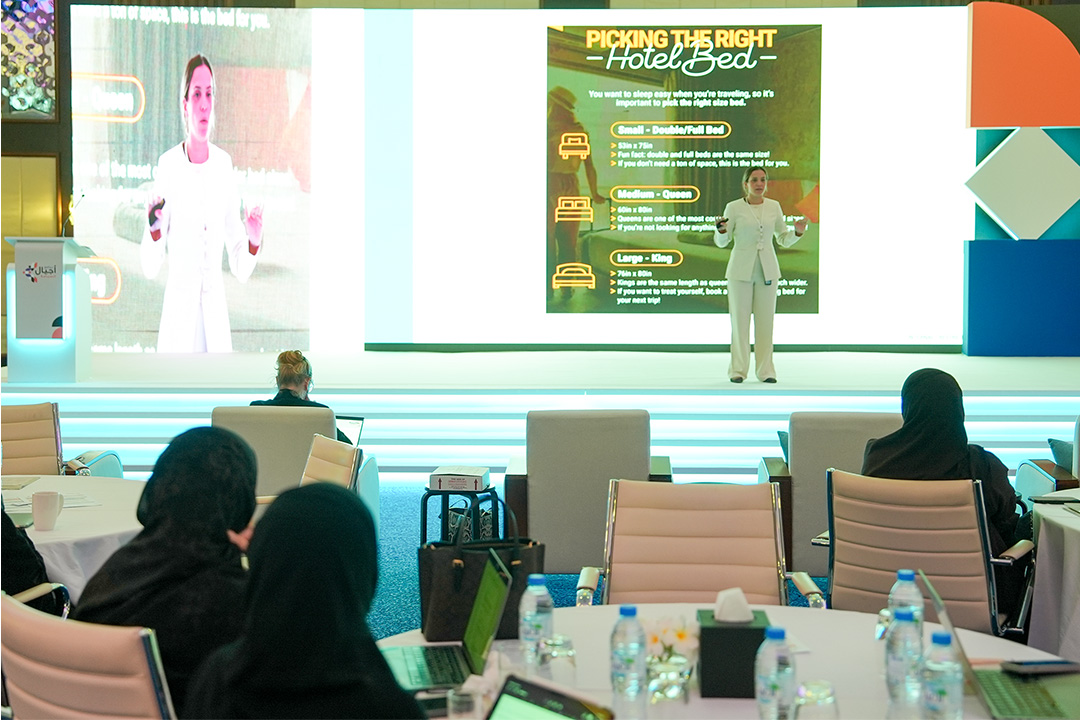 Presenter speaking to participants during the Youth Tourism Summer Camp